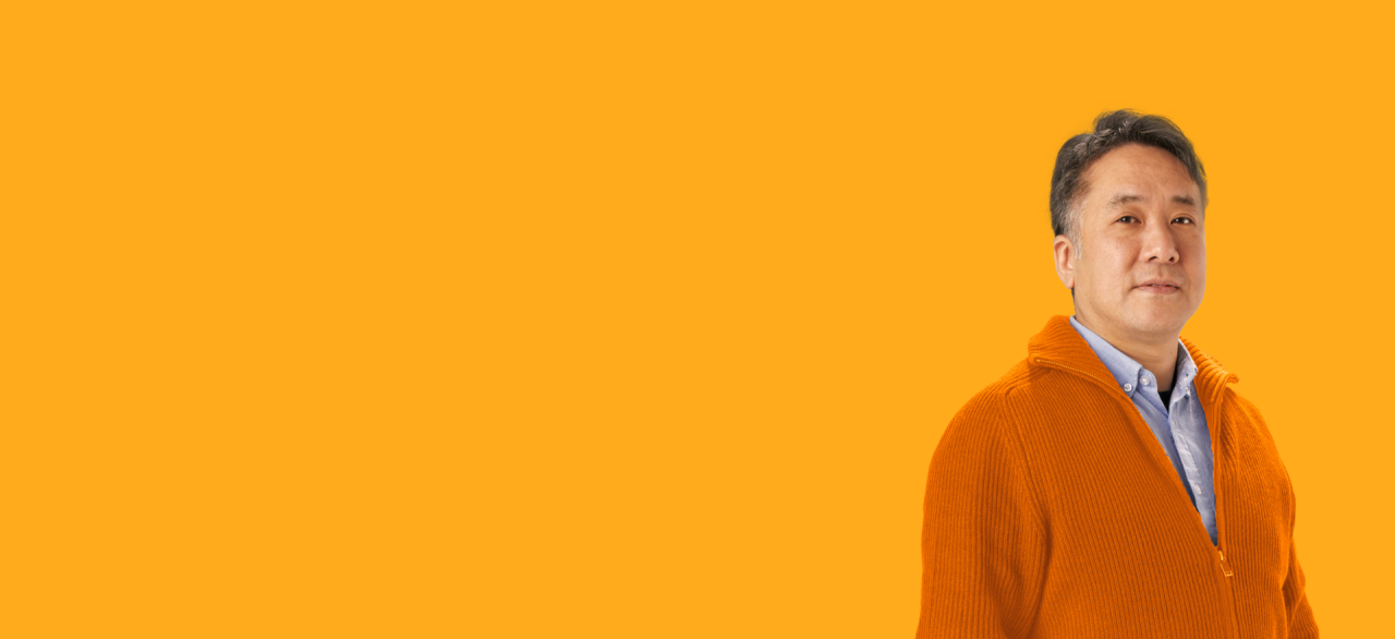 man in an orange jumper