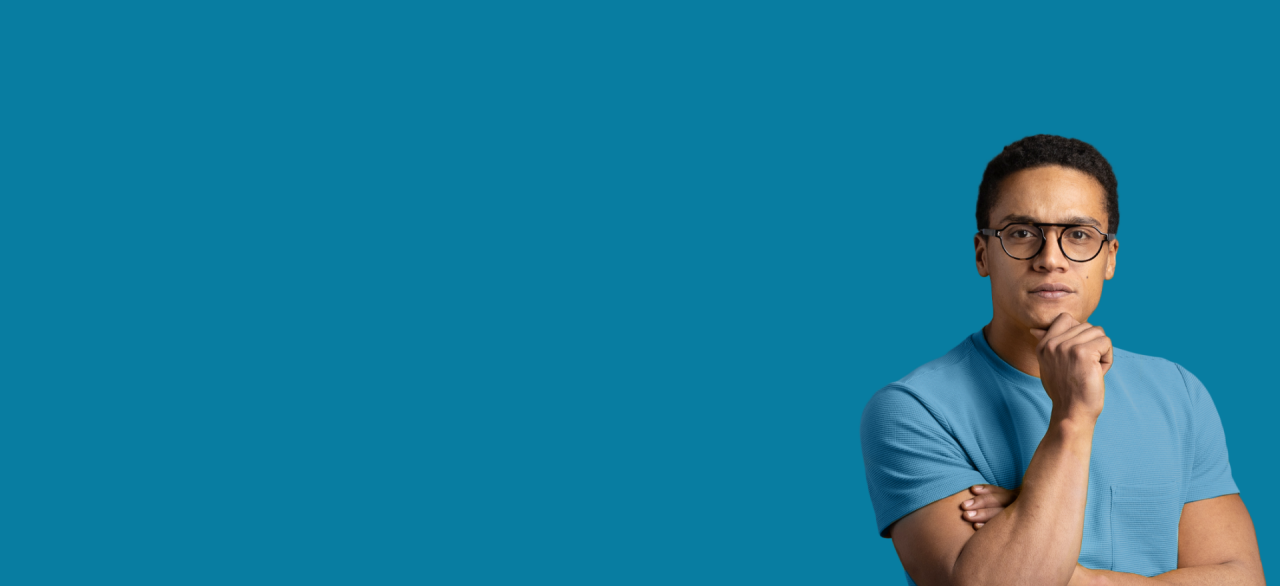 man with hand on chin